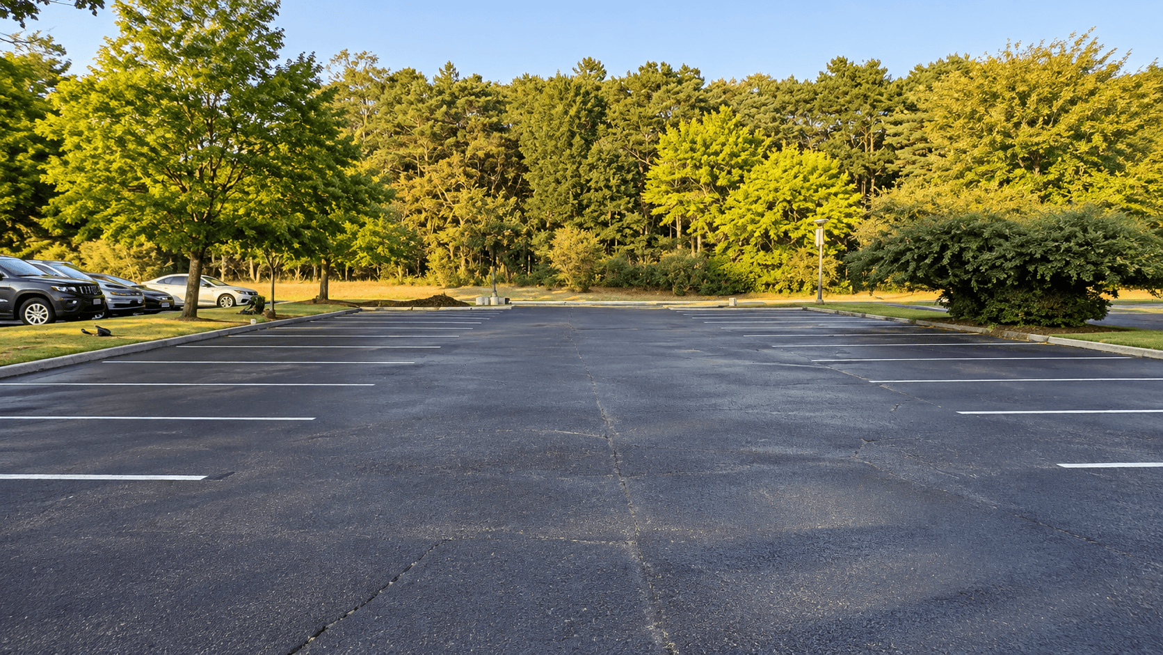 Seal coated commercial lot surface protected against weather and freeze-thaw wear in the Hamptons, NY