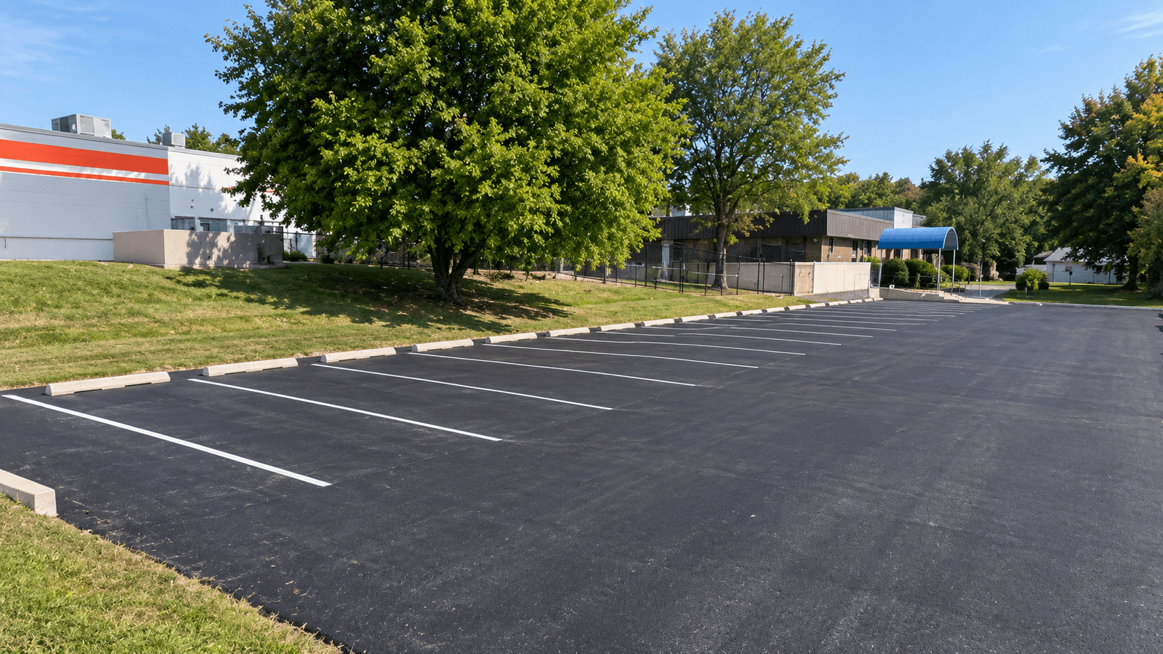Resurfaced nursing facility parking lot with clean white stall markings in Ohio