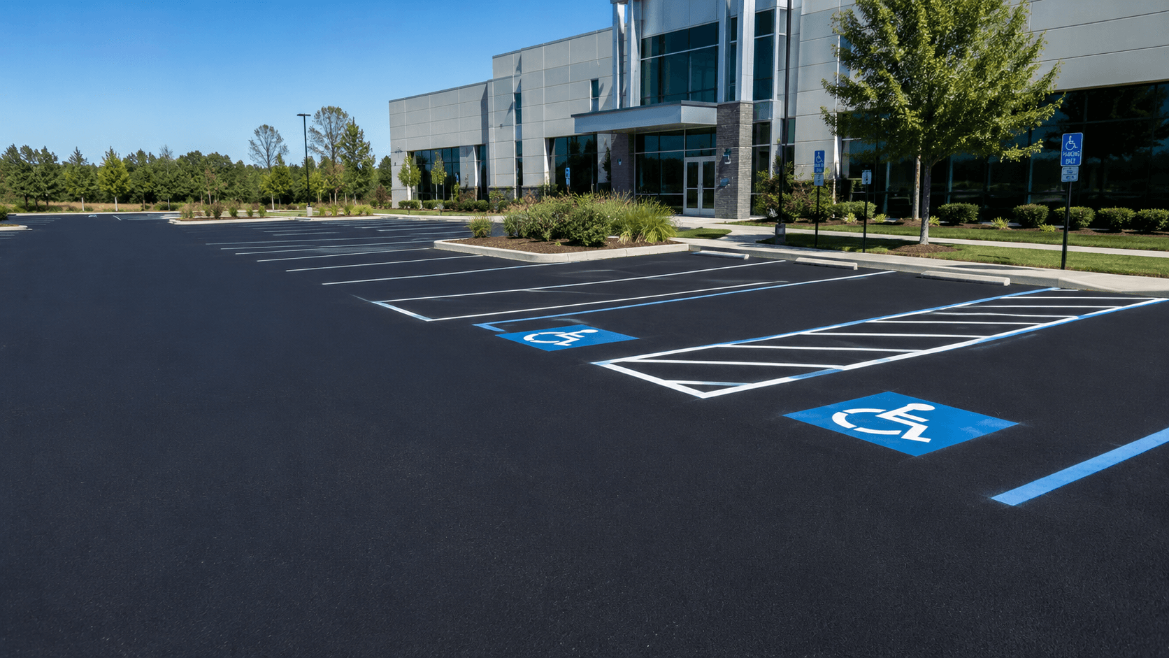 Well-maintained commercial parking lot with fresh seal coat and crisp striping